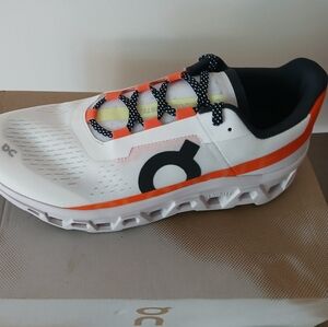 On Running Shoes with Orange and Black Highlights